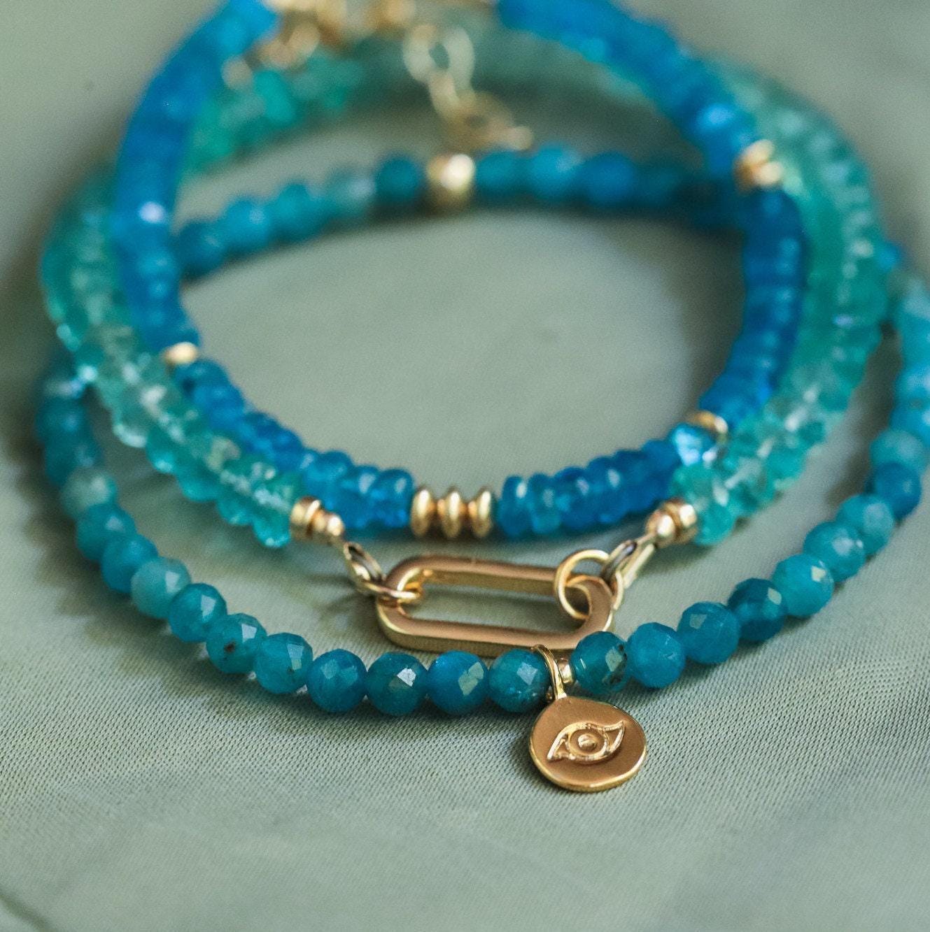 Aapatite bracelet with 14K gold accents from Earthly Abundance, featuring polished blue-green apatite stones on a delicate chain.