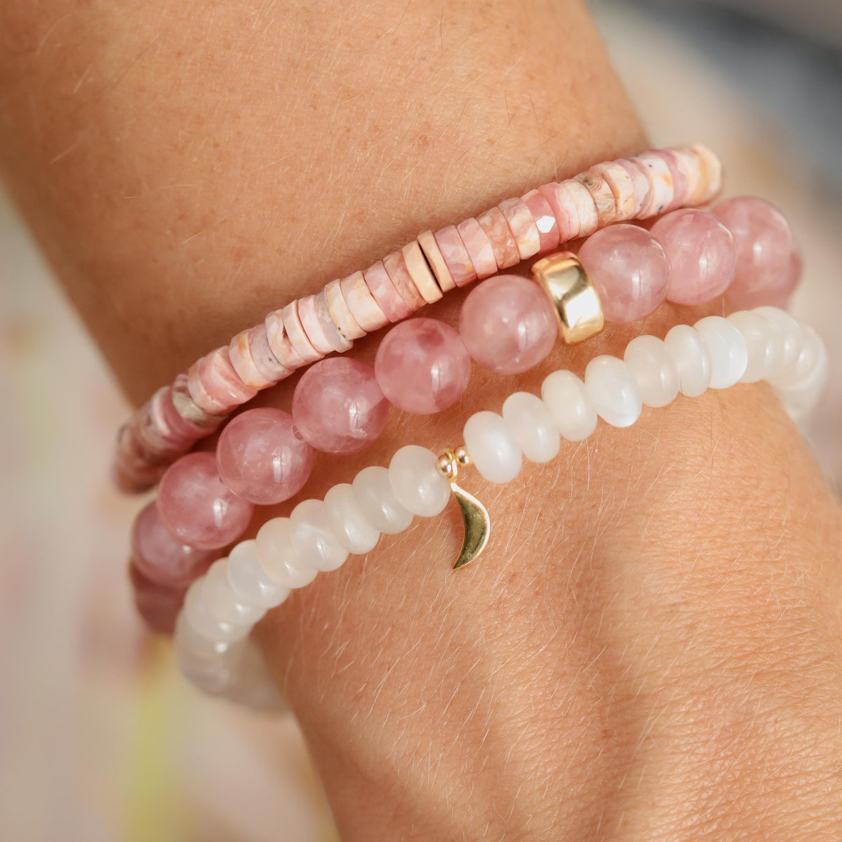 8mm Madagascar Rose Quartz bead from Earthly Abundance, showcasing its soft pink color and smooth polished surface.