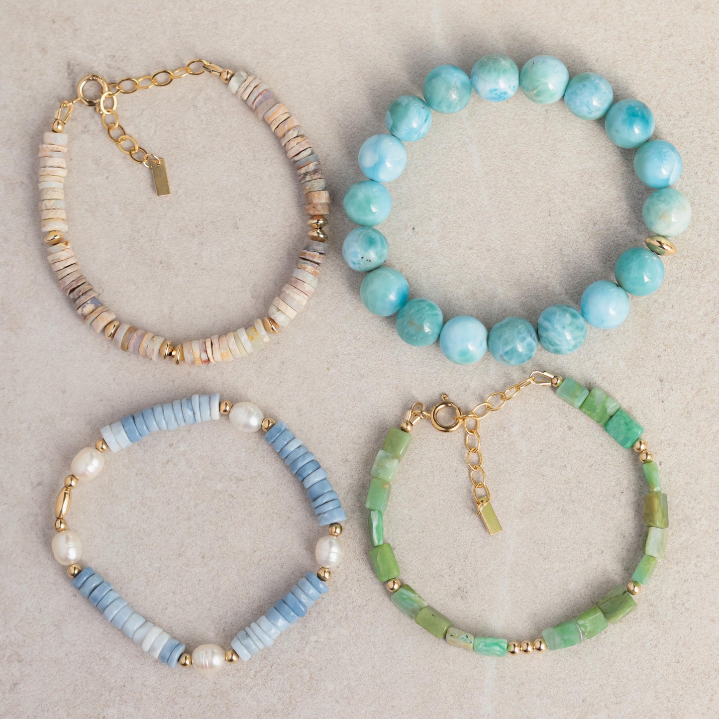 Australian Opal bracelet by Earthly Abundance featuring vibrant, colorful opal stones on a delicate silver chain.