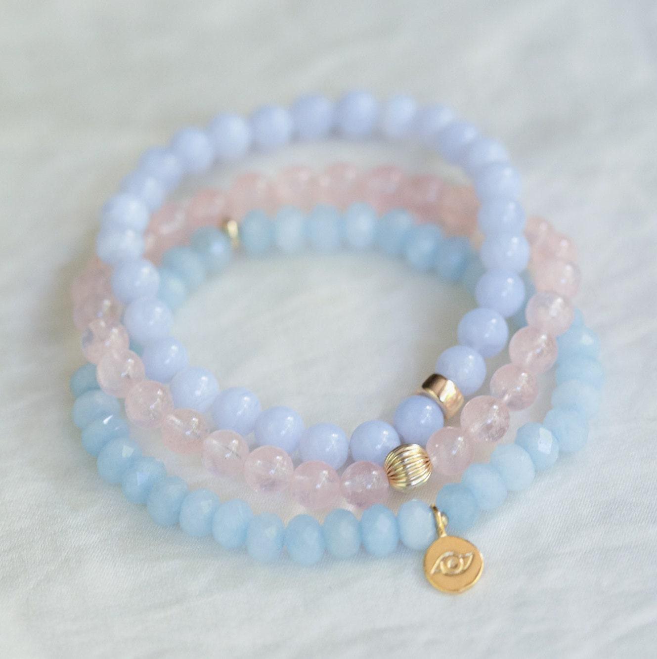 Aquamarine evil eye bracelet by Earthly Abundance Jewelry featuring blue beads and a protective evil eye charm.