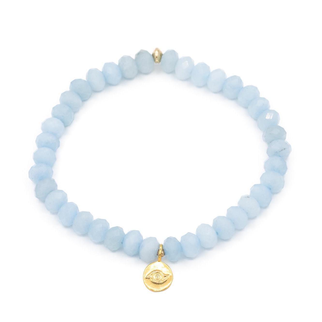 Aquamarine evil eye bracelet by Earthly Abundance Jewelry featuring blue beads and protective evil eye charm.