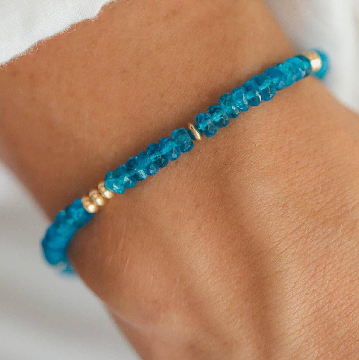 Zambia Apatite bracelet with polished blue-green stones on a delicate silver chain, from Earthly Abundance Jewelry.