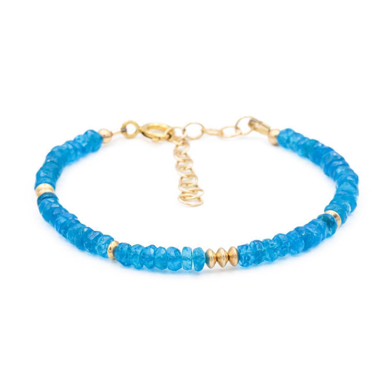 Earthly Abundance Jewelry Zambia Apatite bracelet featuring vibrant blue-green gemstones on a delicate silver chain.