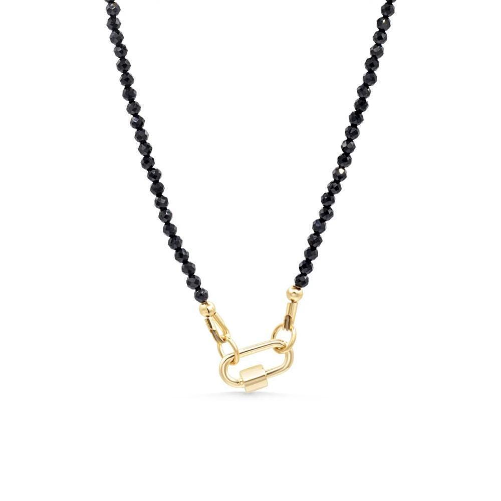 Lore Black Tourmaline Necklace with 14K gold chain from Earthly Abundance, featuring a polished black tourmaline pendant.
