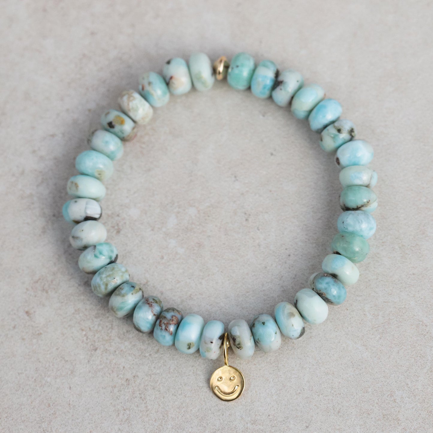 Happy Heart Stack featuring Mangano Calcite, Hemimorphite, and Larimar gemstones stacked together, showcasing vibrant blue and pink hues.
