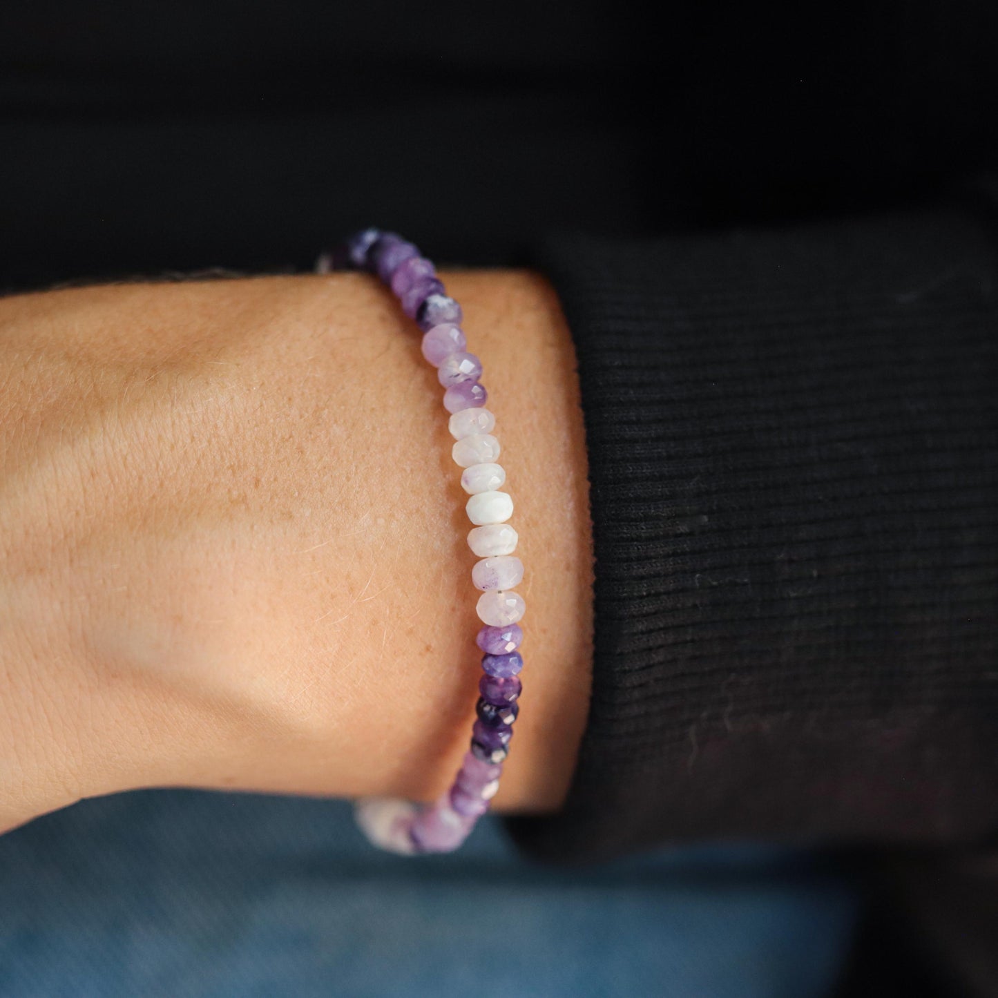 Earthly Abundance Tiffany purple opal bracelet featuring vibrant purple opals on a delicate silver chain.