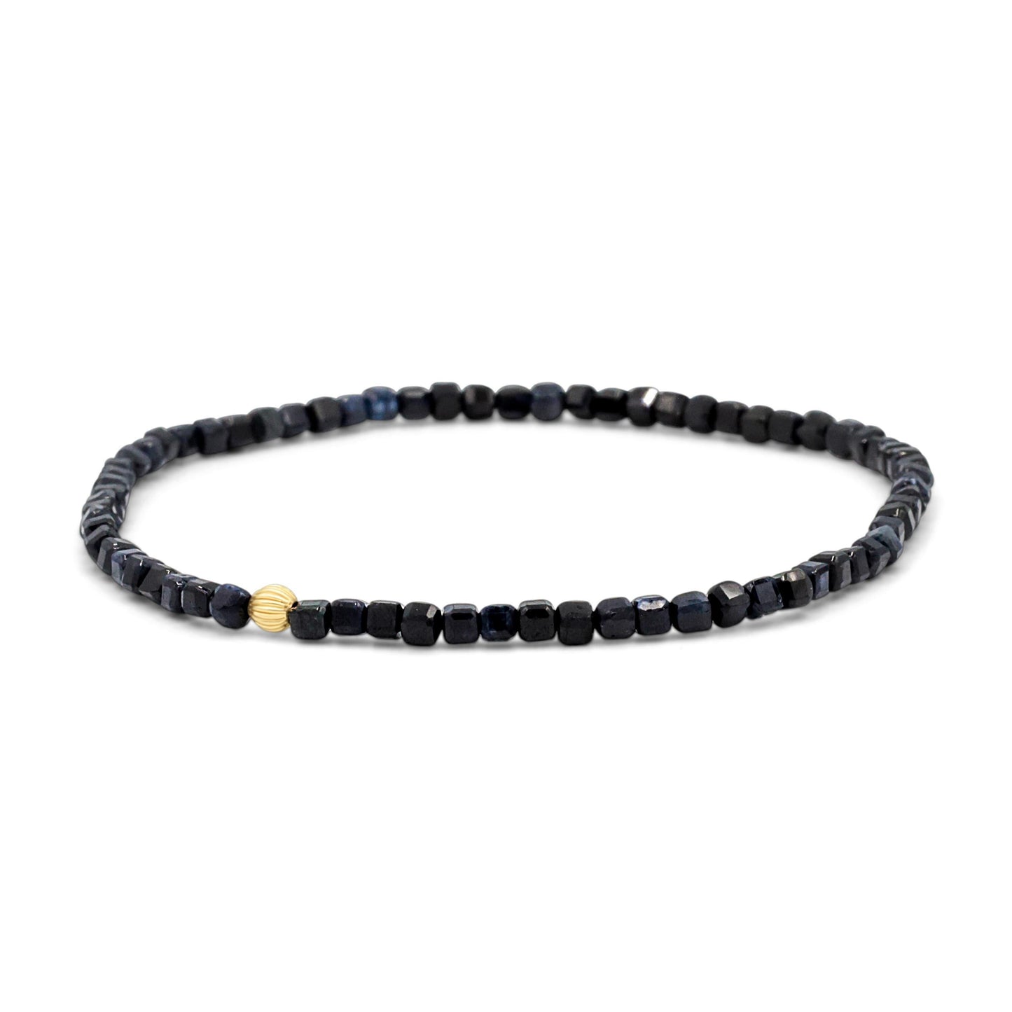 Blue sapphire cube bracelet by Earthly Abundance featuring polished blue sapphire beads on a delicate silver chain.