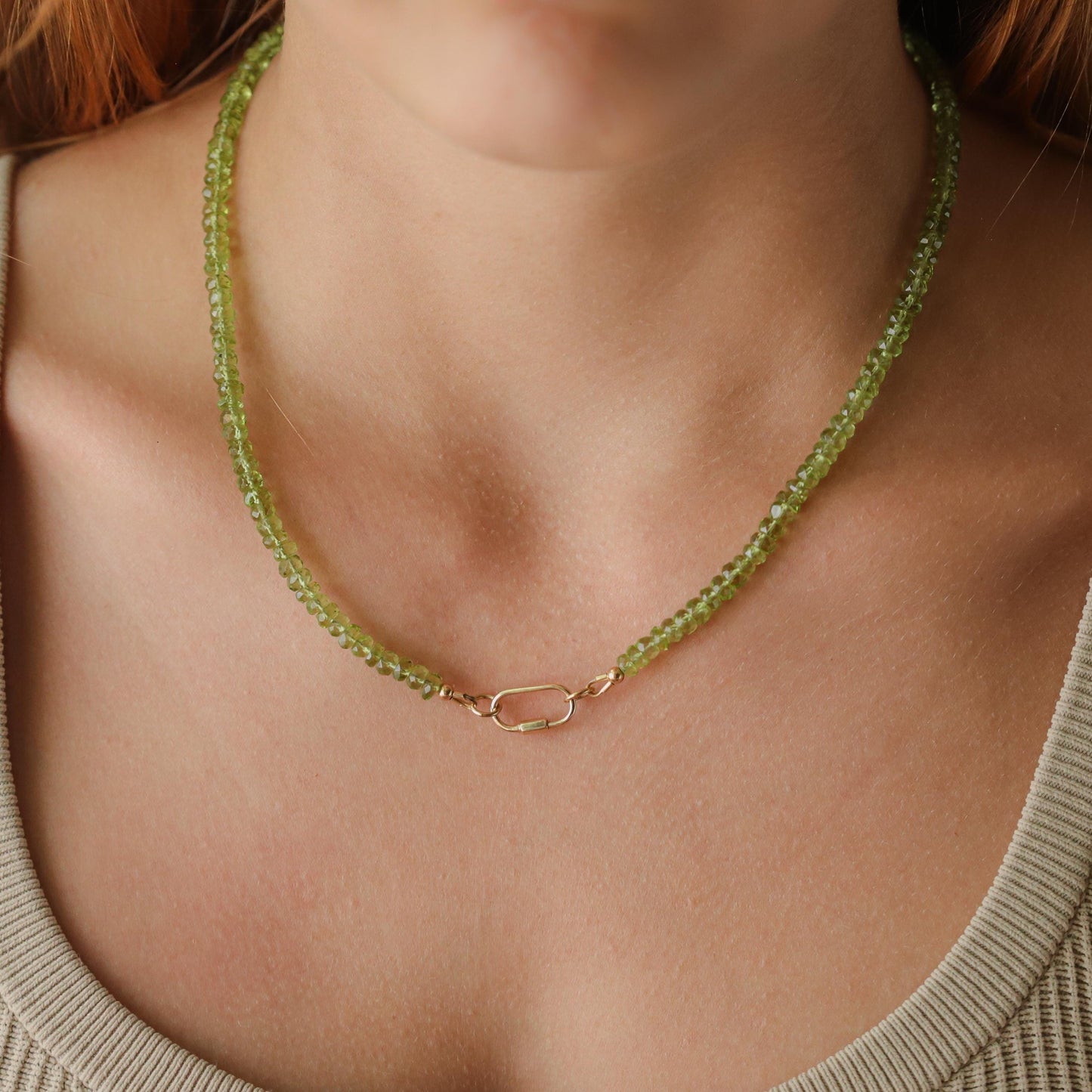 Peridot pearl carabiner necklace by Earthly Abundance featuring green peridot stones and elegant pearl accents.