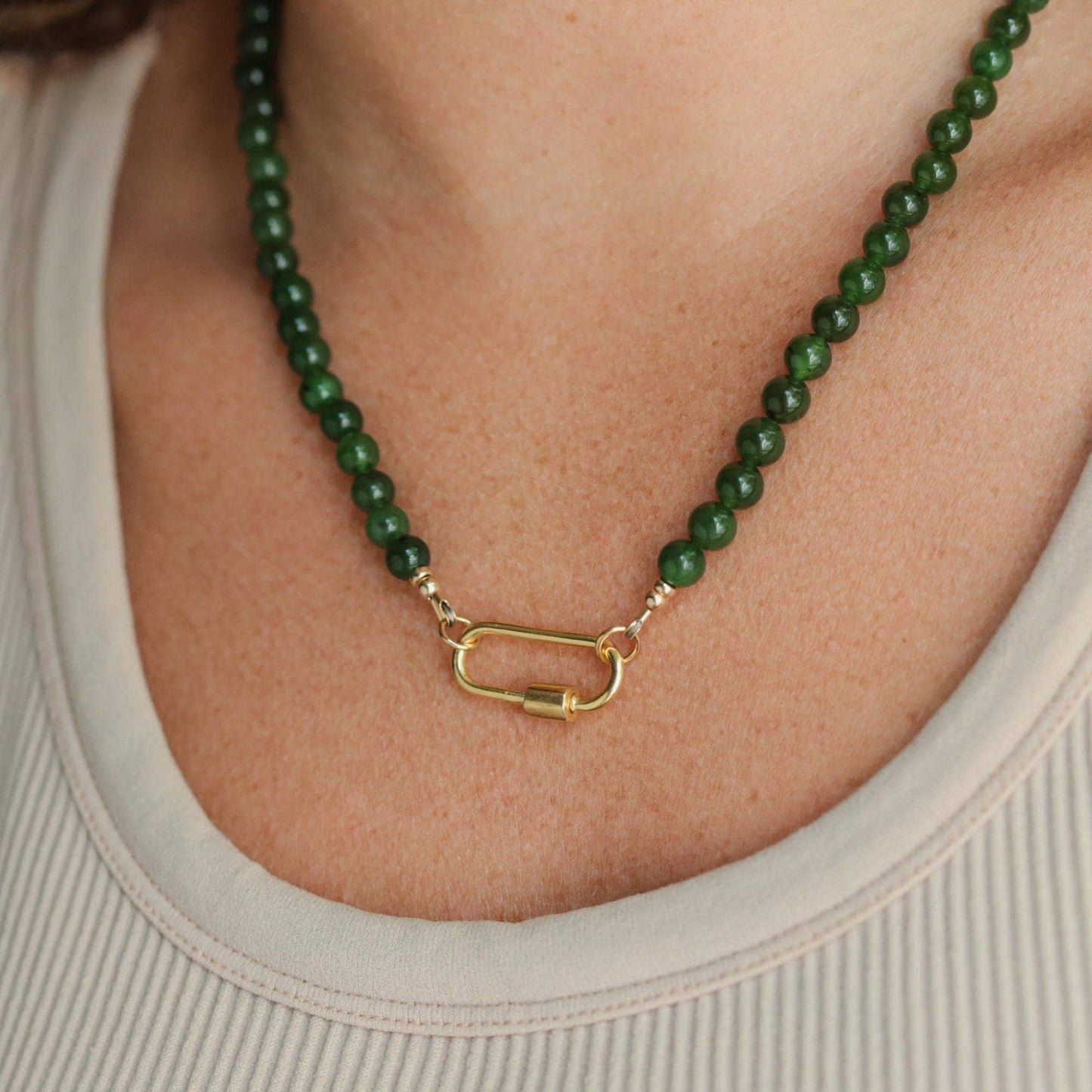 Canadian Jade Abundance Necklace by Earthly Abundance featuring a polished green jade pendant on a delicate chain.