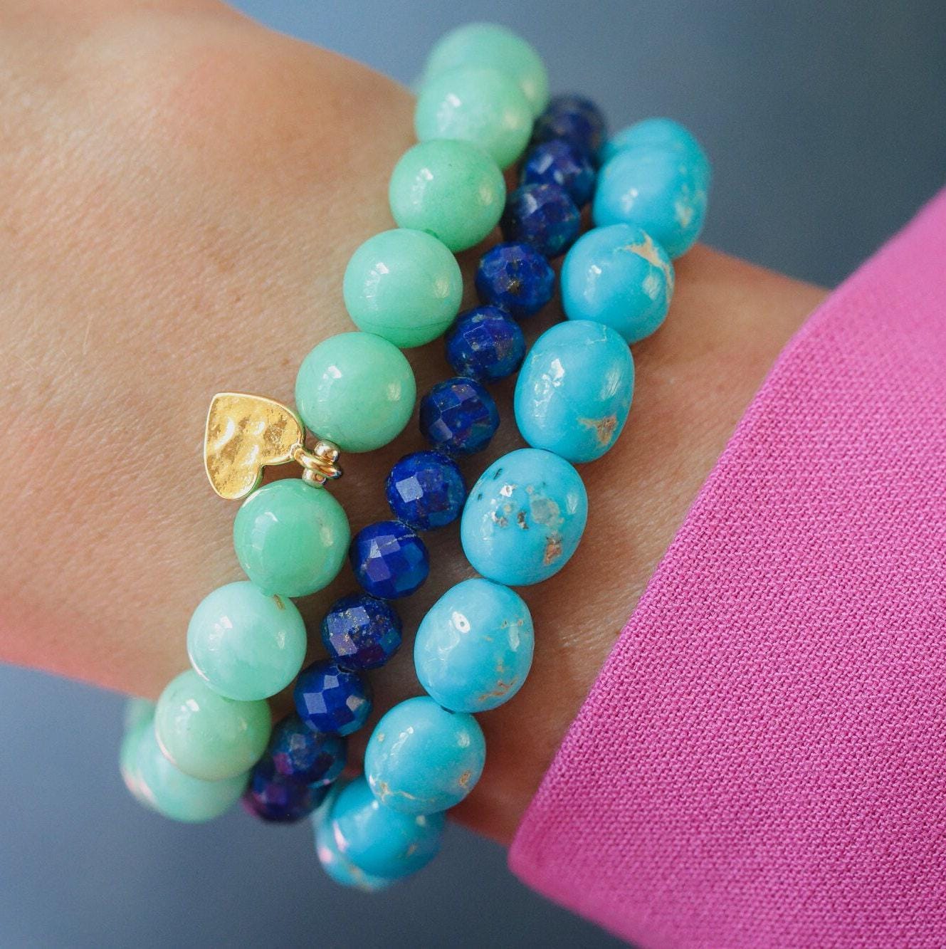Faceted Lapis Lazuli bracelet from Earthly Abundance Jewelry featuring deep blue stones with gold-toned accents.