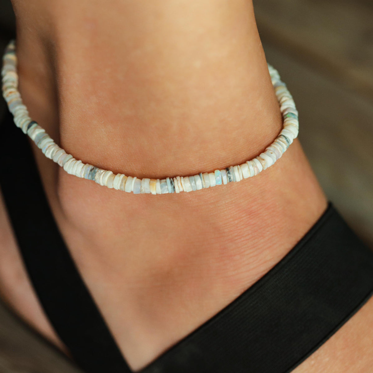 Australian Opal anklet from Earthly Abundance featuring sparkling opal stones on a delicate silver chain.