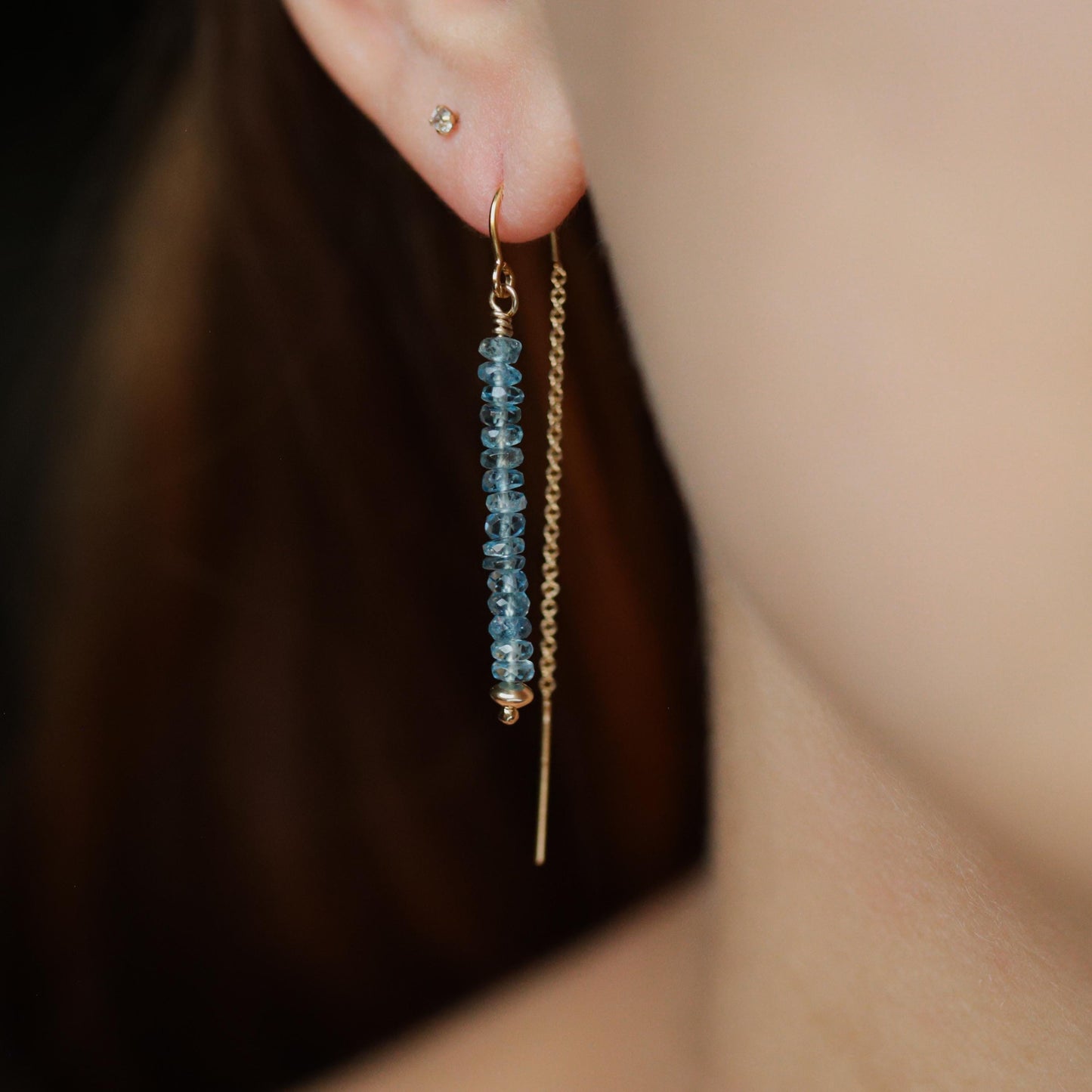 Santa Maria Aquamarine threader earrings by Earthly Abundance, featuring blue aquamarine stones and delicate silver chains.