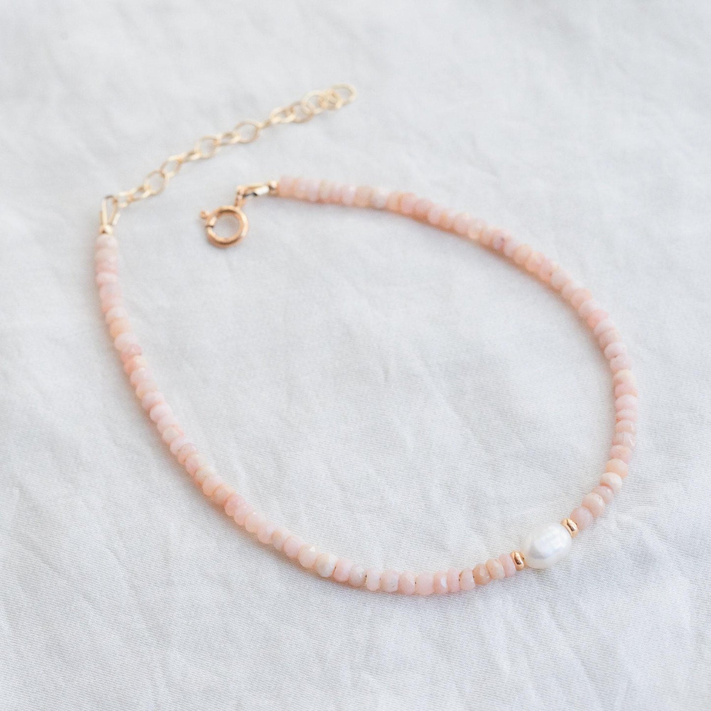 14K gold-filled Sea Blush Anklet by Earthly Abundance featuring delicate chain with sea-inspired charm and adjustable clasp