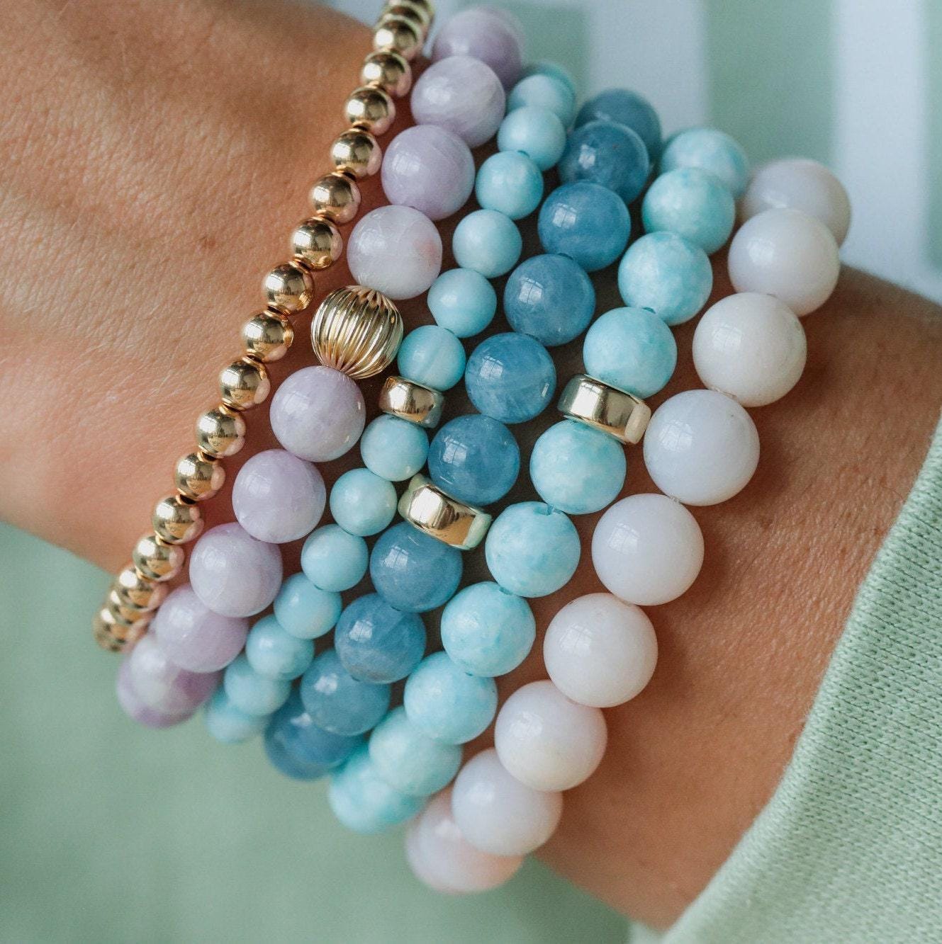 Bold pink opal bracelet with 14K gold accents, featuring vibrant pink gemstones and elegant design by Earthly Abundance.