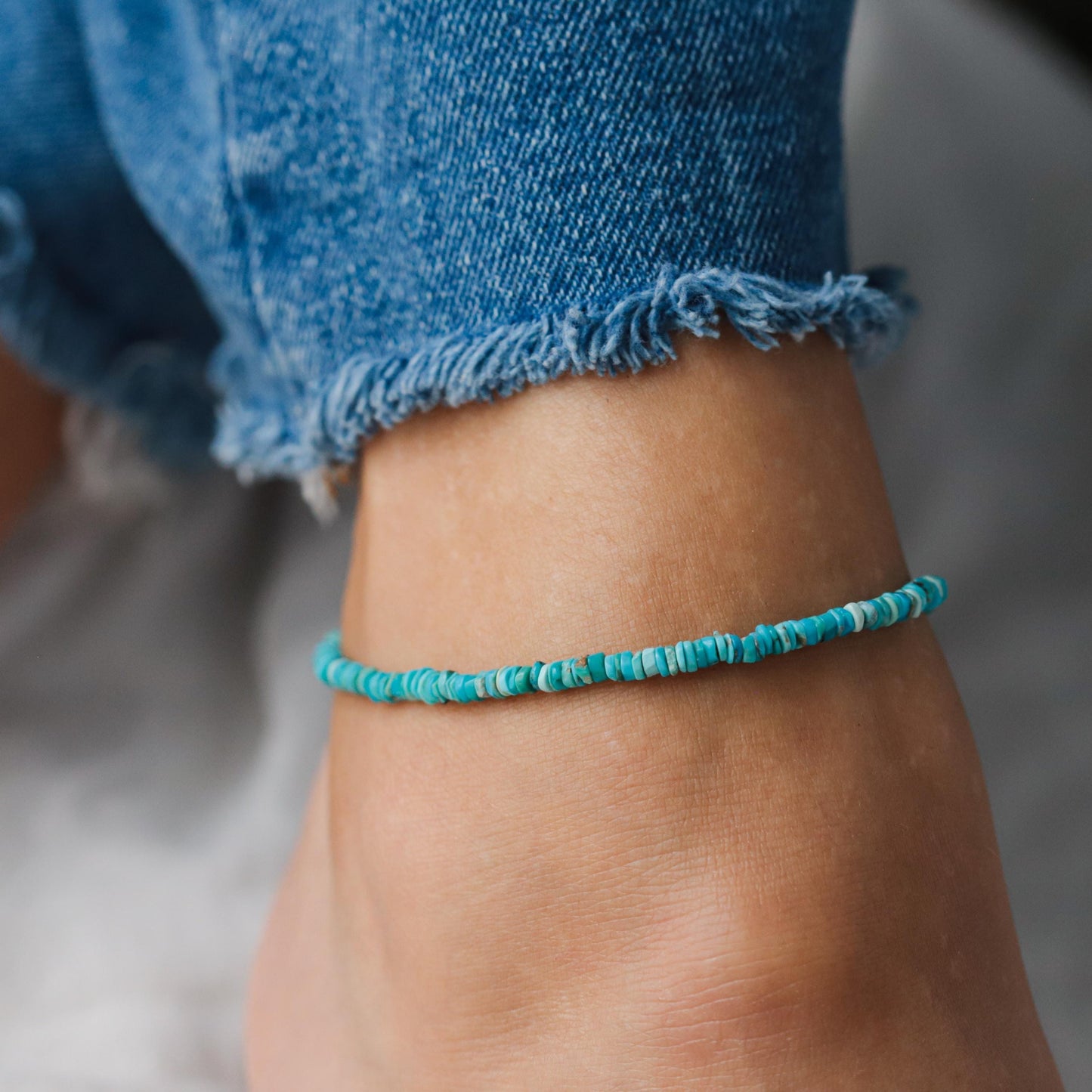 Earthly Abundance turquoise heishi anklet with earthy textured beads, perfect for boho or casual summer style.