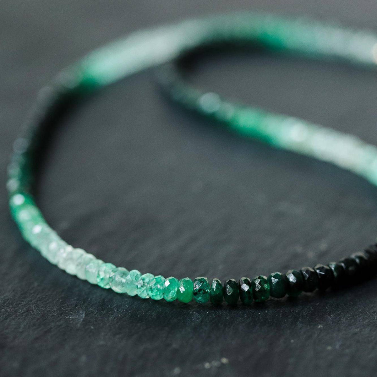 Ombre emerald necklace from Earthly Abundance Jewelry featuring a gradient green gemstone pendant on a delicate chain.