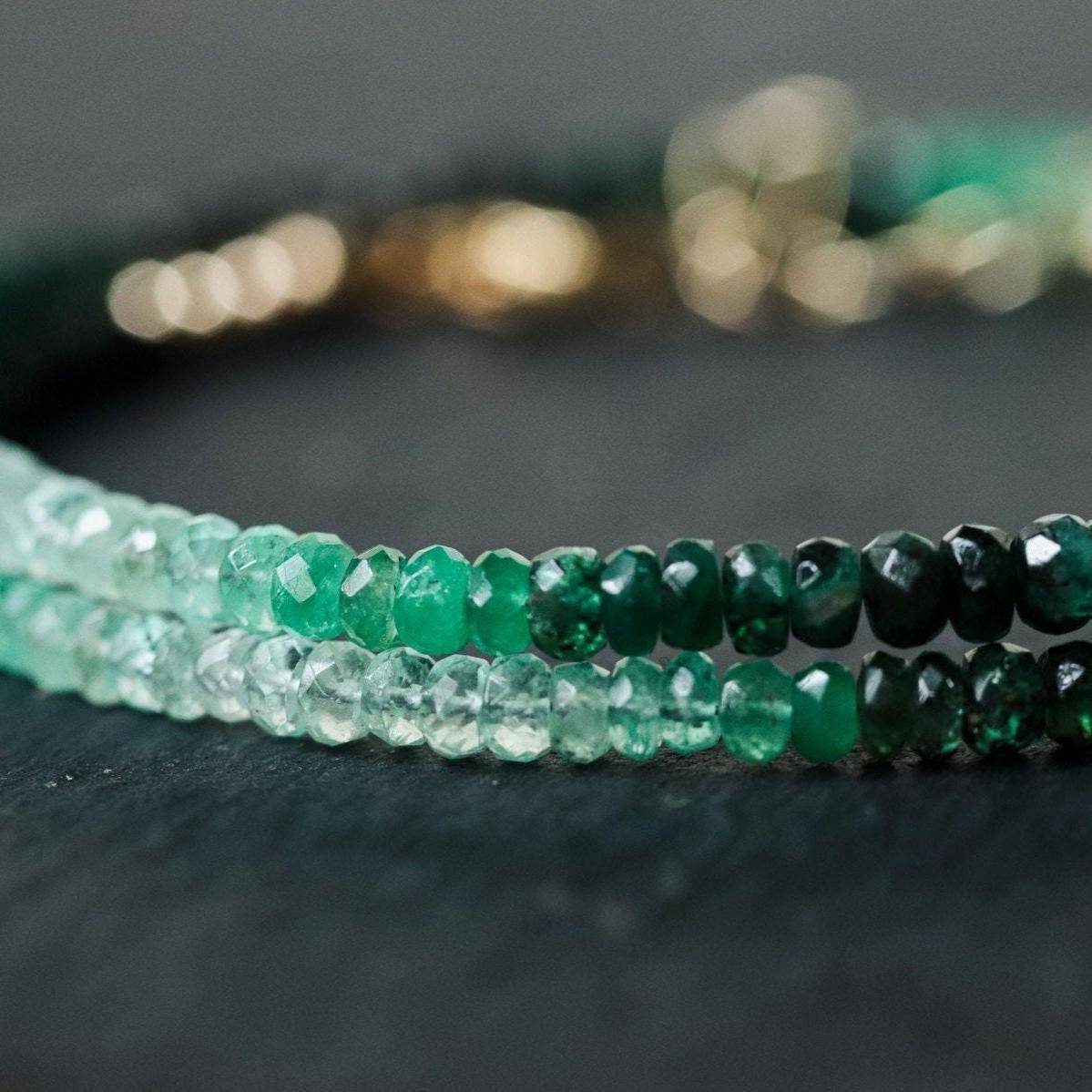 Ombre emerald necklace from Earthly Abundance Jewelry featuring a gradient of green gemstones on a delicate chain.