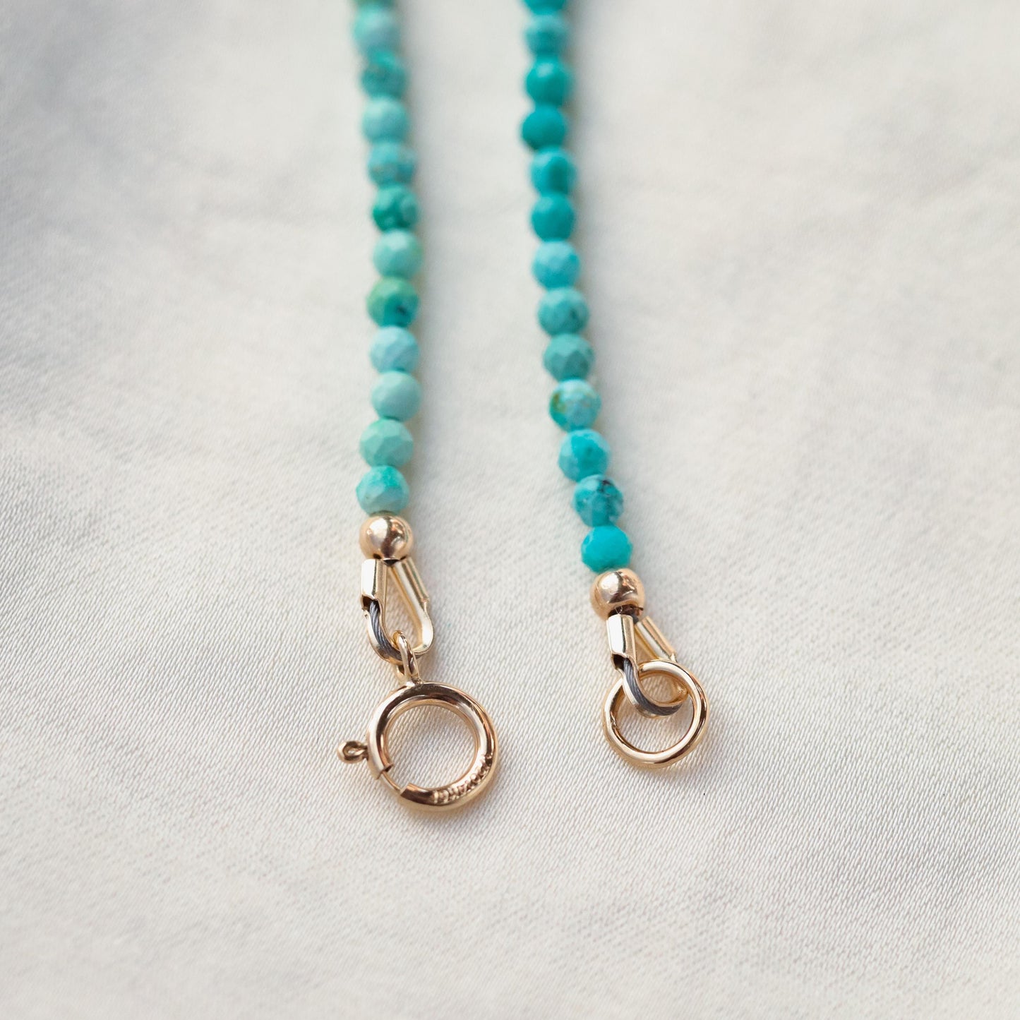 Turquoise and amethyst mermaid heart necklace by Earthly Abundance featuring a pendant with ocean-inspired colors and intricate design.