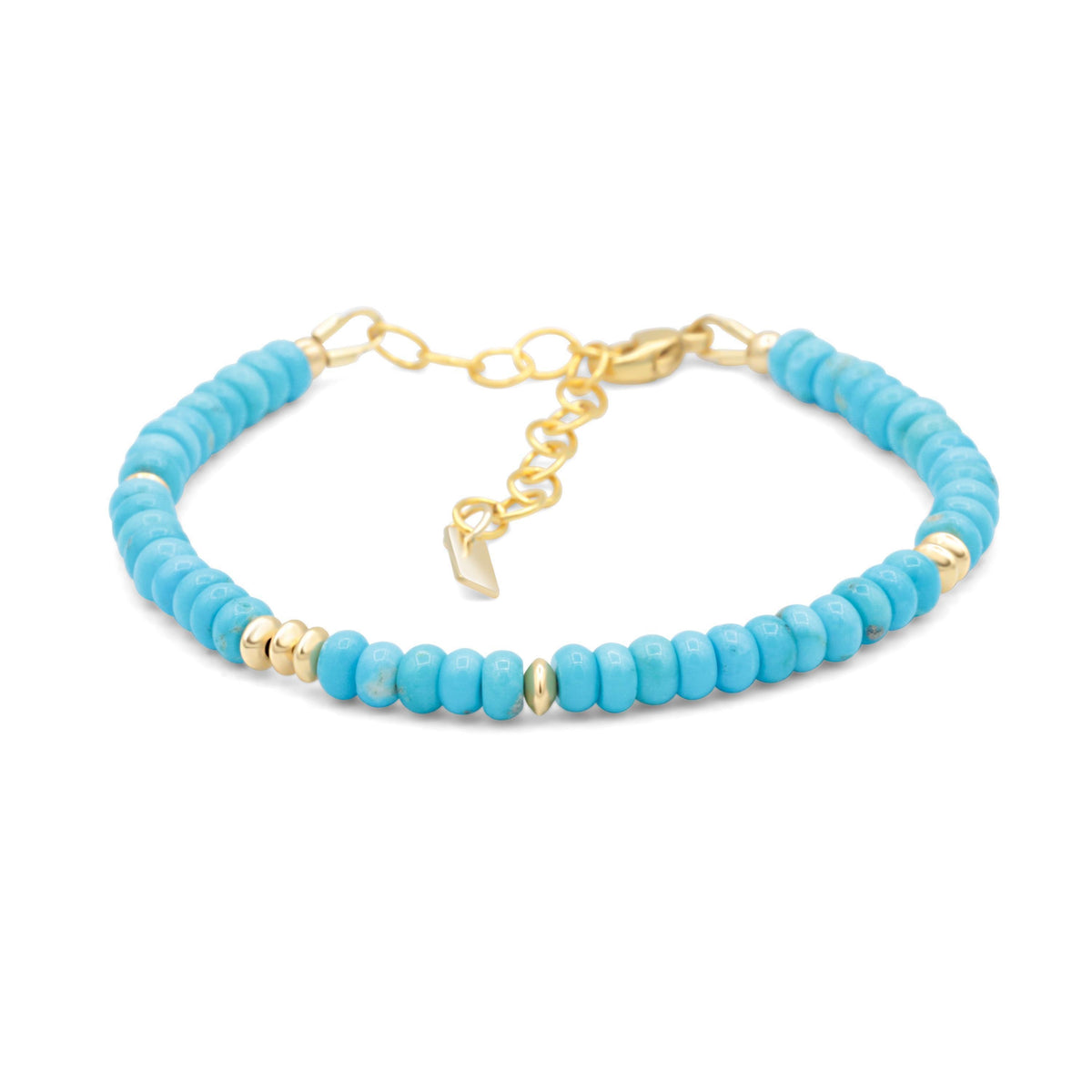 Smooth Rondel Sleeping Beauty turquoise gemstone from Earthly Abundance, showcasing its vibrant blue color and polished round shape.