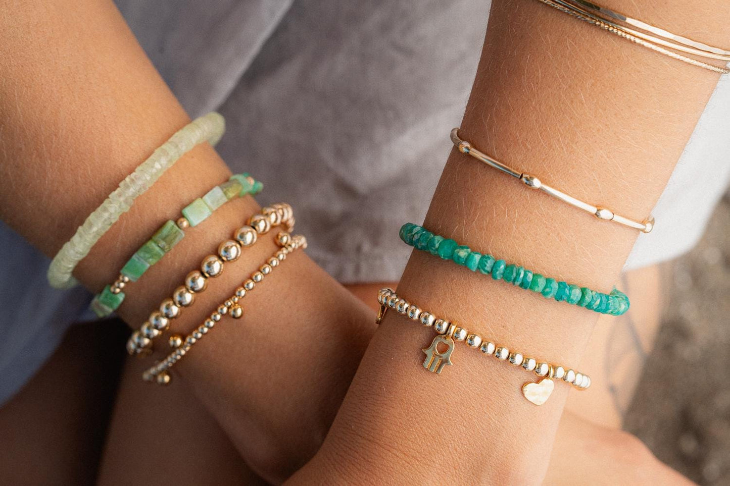 Heart-centered Amazonite bracelet by Earthly Abundance featuring polished blue-green stones on a delicate string.