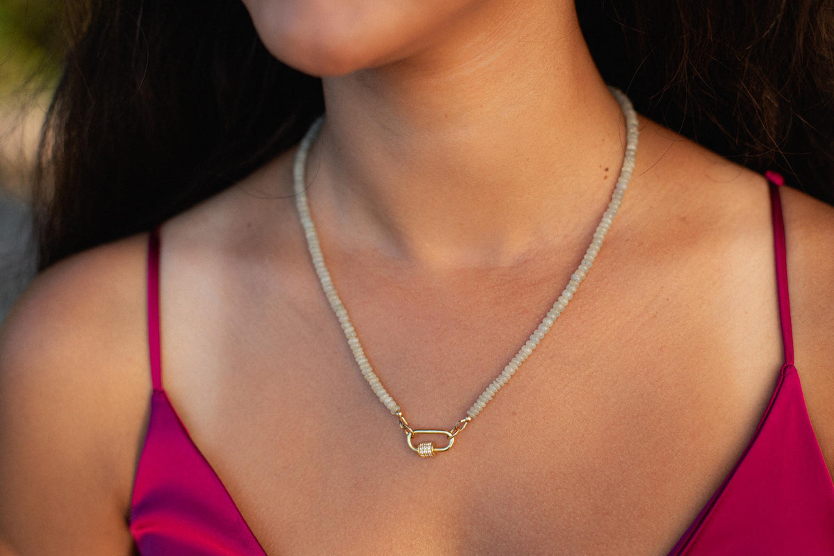 Grey sapphire topaz necklace featuring a silver chain and a central grey sapphire topaz gemstone, elegant jewelry piece by Earthly Abundance.