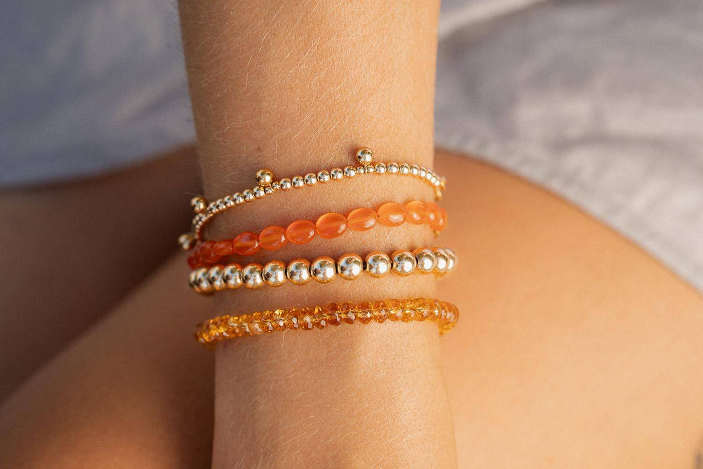 Citrine carabiner bracelet by Earthly Abundance Jewelry featuring polished citrine stones on a metal chain.