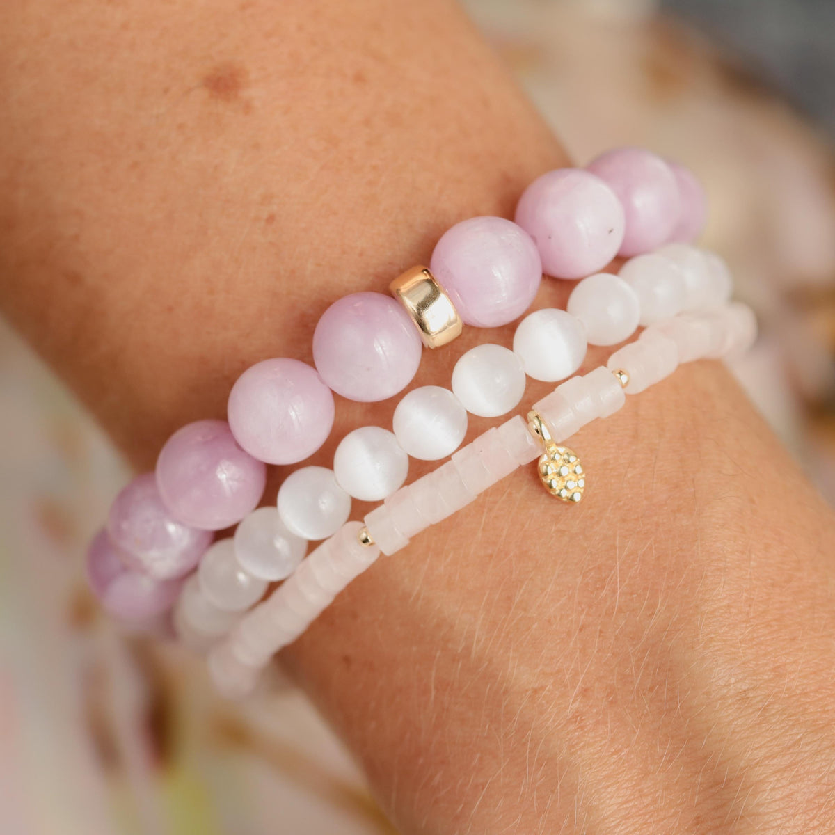 Earthly Abundance Jewelry selenite bracelet featuring smooth, translucent white stones on an elastic band for spiritual and aesthetic wear.