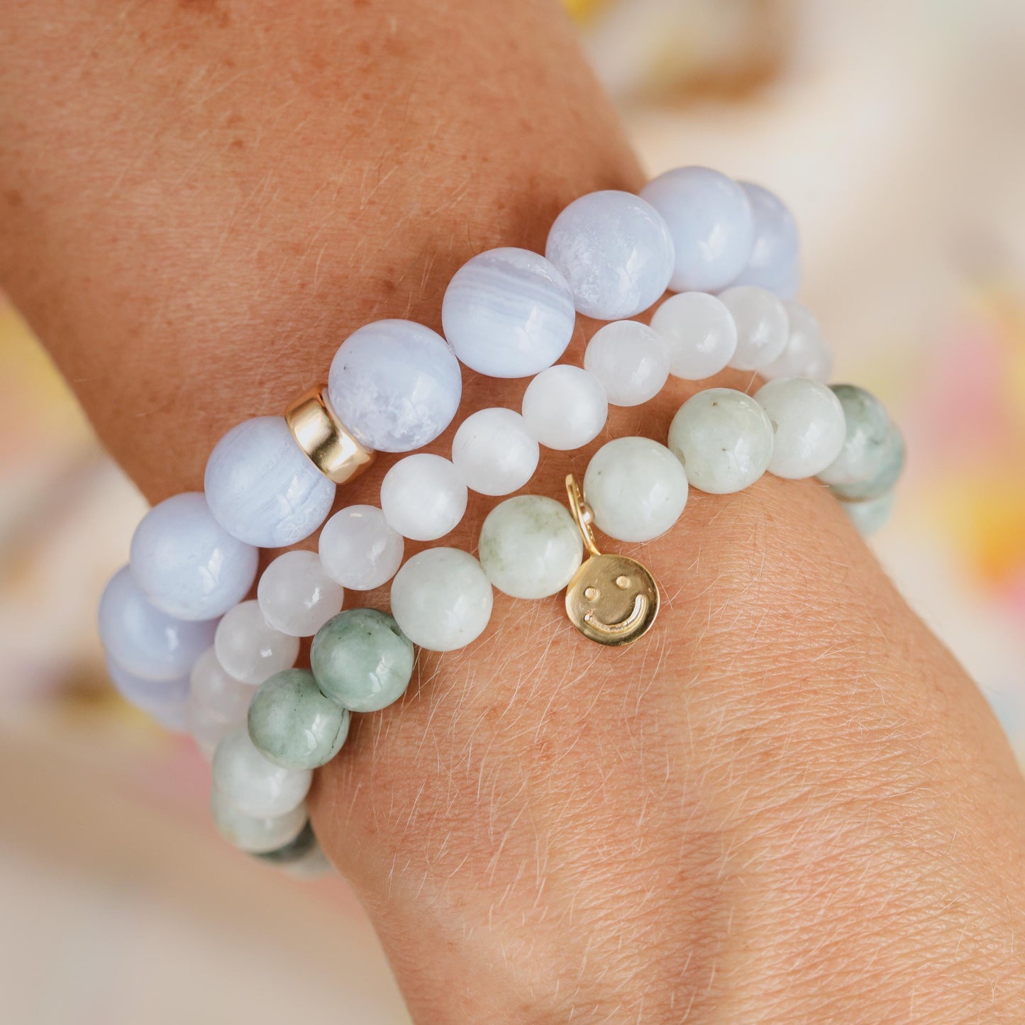 Selenite bracelet by Earthly Abundance Jewelry featuring smooth, translucent white selenite stones on an elastic band.
