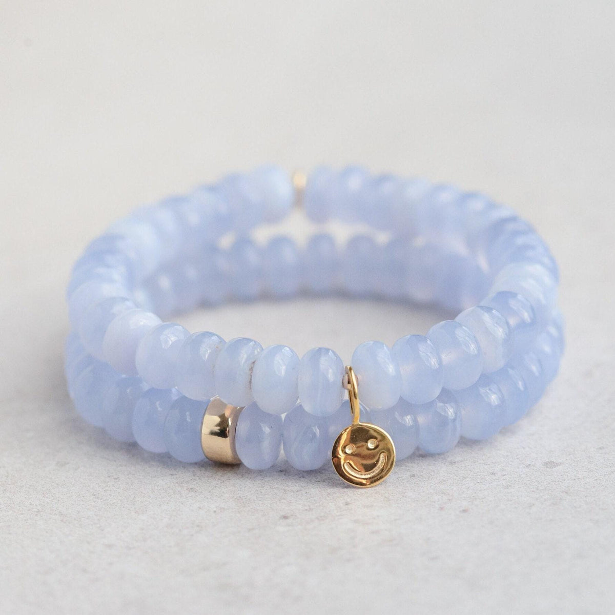 Blue lace agate cloudlight bracelet by Earthly Abundance featuring smooth, polished beads with a calming blue hue.