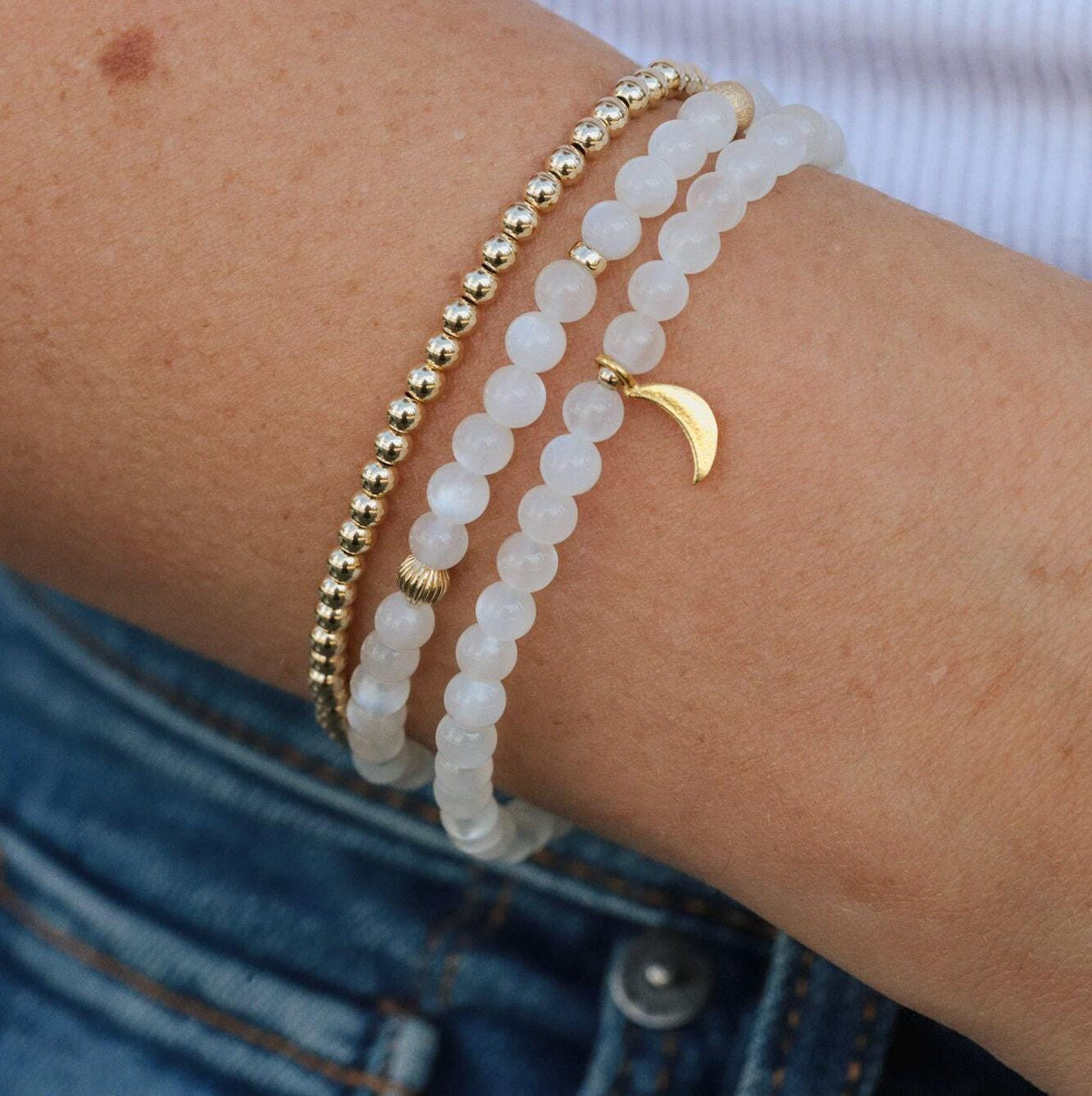 14K moonstone bracelet by Earthly Abundance Jewelry featuring polished moonstone beads on a delicate chain