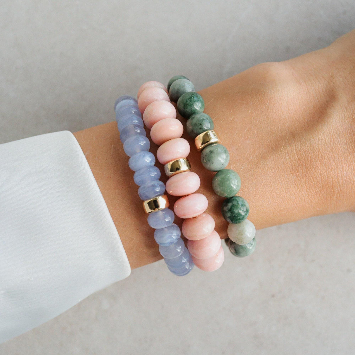 Blue Lace Agate Cloudlight bracelet by Earthly Abundance featuring polished blue agate stones and delicate silver accents.