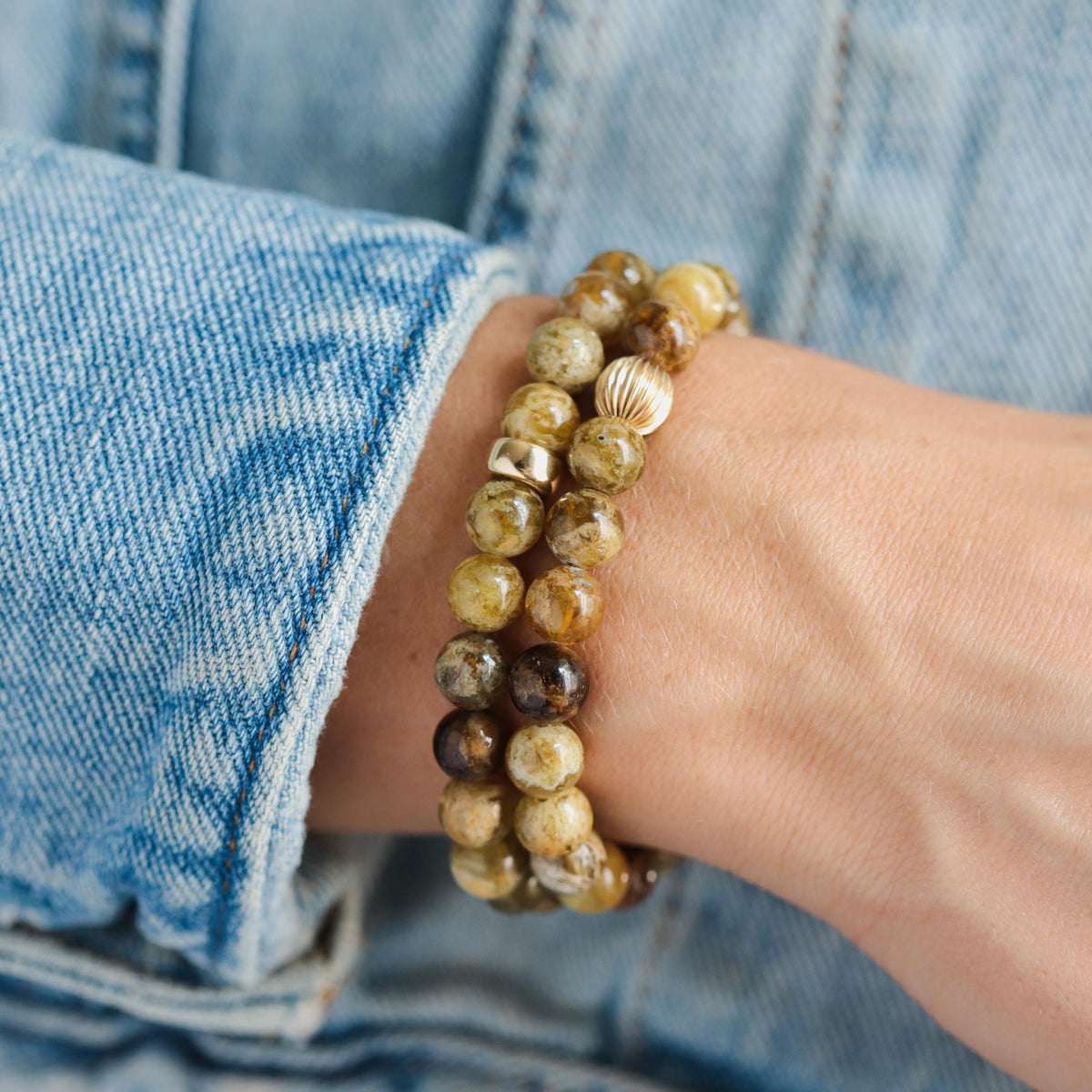 Green Garnet bracelet with 14K gold setting, featuring polished green garnet stones on a delicate gold chain.