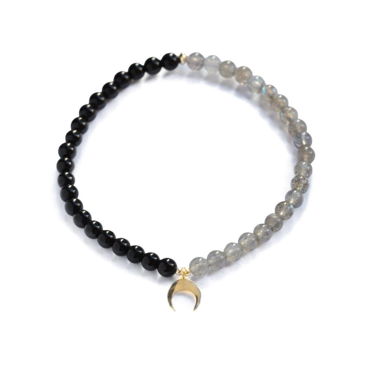 Black Tourmaline and Labradorite moon pendant from Earthly Abundance Jewelry, featuring polished stones on a delicate chain.