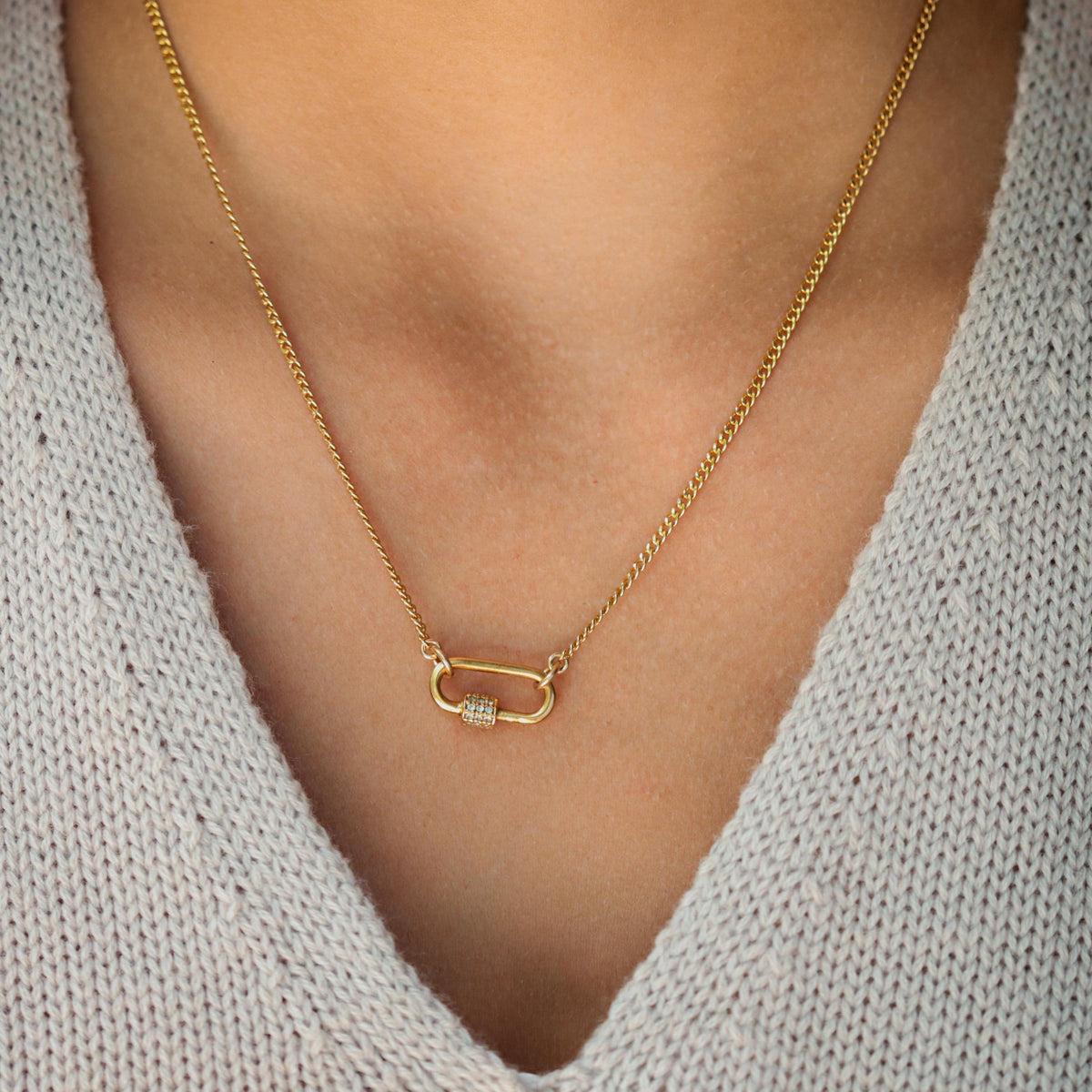 14k gold filled curb chain necklace by Earthly Abundance, showcasing a sturdy, shiny gold chain with a classic curb link design.