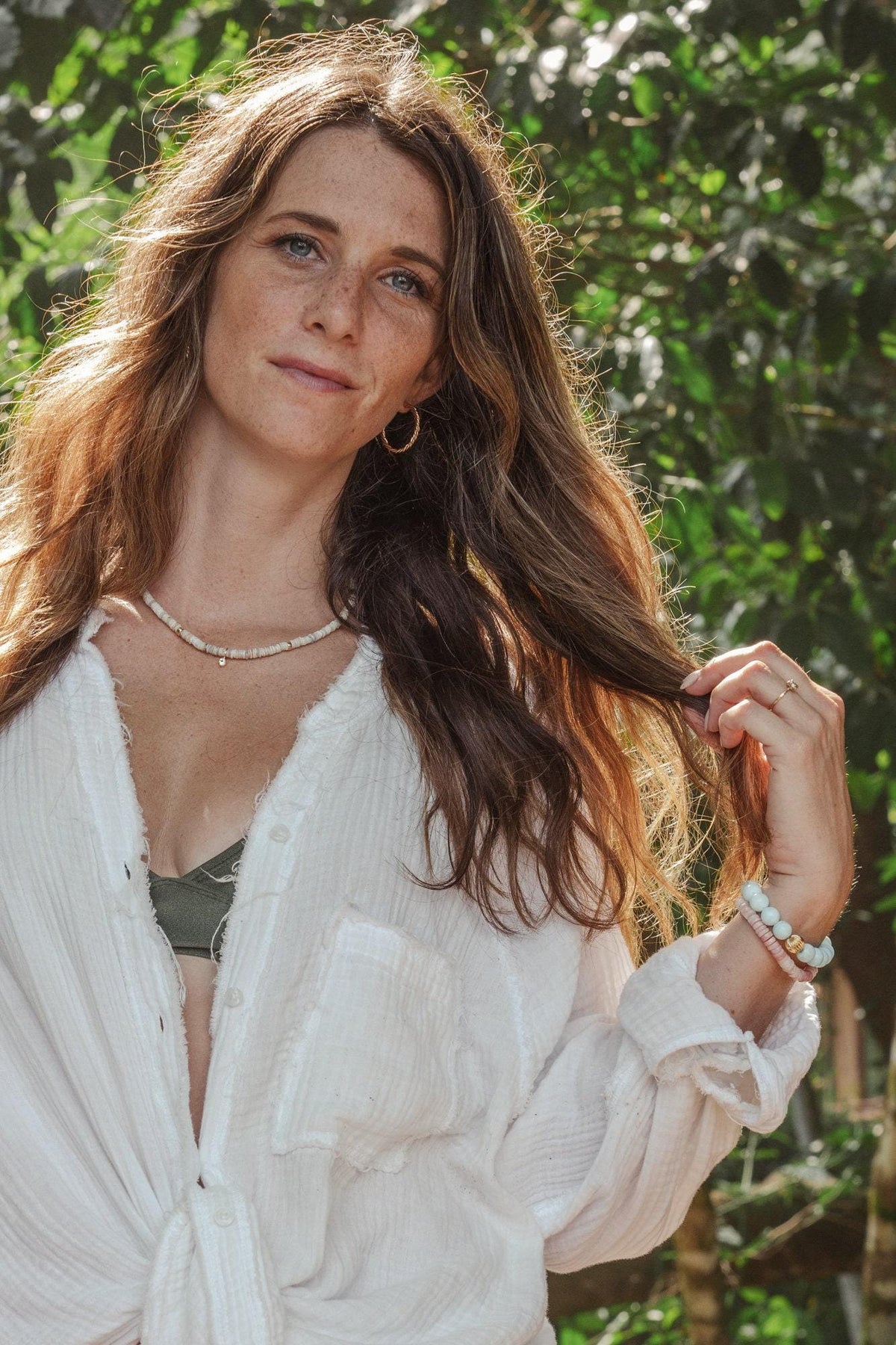 Australian opal and white topaz necklace with a delicate silver chain, featuring vibrant opal and sparkling topaz stones.
