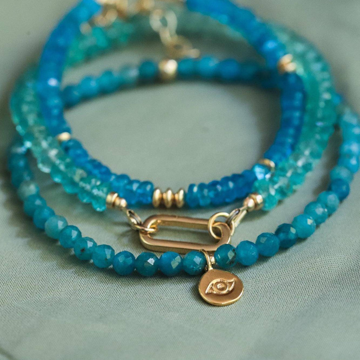 Zambia Apatite bracelet by Earthly Abundance Jewelry featuring vibrant blue-green apatite stones on a delicate string.