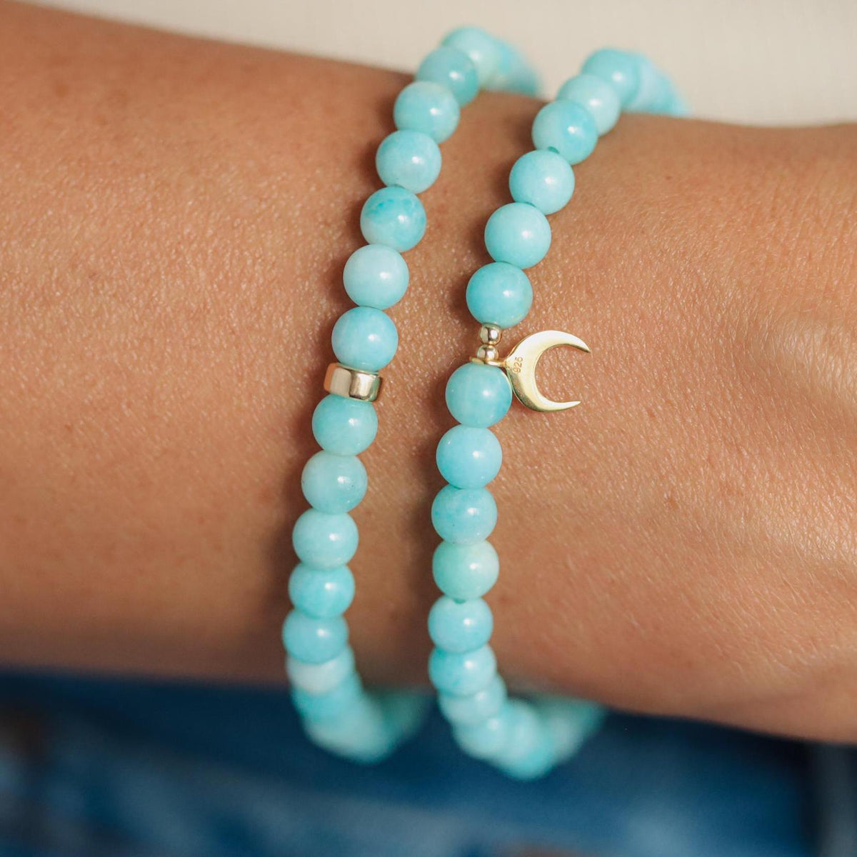 Peruvian Amazonite bracelet with 5mm beads from Earthly Abundance, showcasing vibrant blue-green stones on a neutral background.