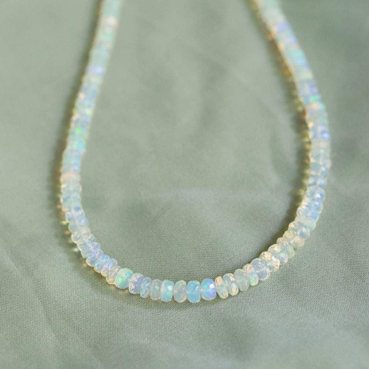 Ethiopian Opal beaded necklace with colorful gemstones, featuring a handcrafted design from Earthly Abundance Jewelry.
