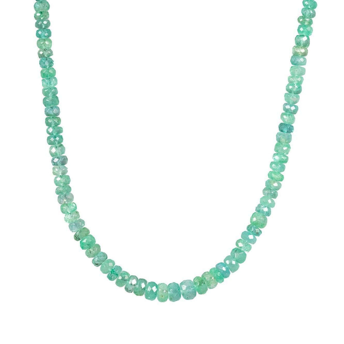 Zambian emerald necklace with 14K gold chain from Earthly Abundance, featuring a vibrant green emerald pendant.