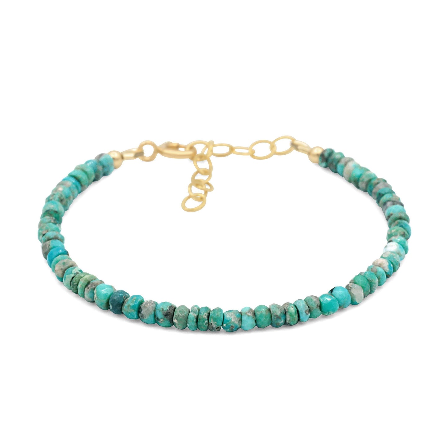 Earthly Abundance Arizona Turquoise beaded bracelet with round turquoise stones and woven thread detailing.