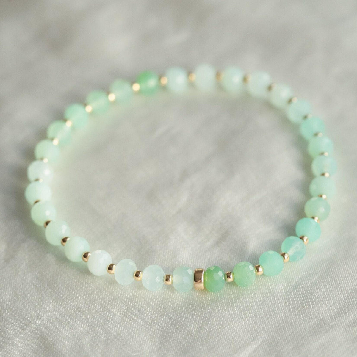 Heart Energy Chrysoprase bracelet by Earthly Abundance Jewelry featuring vibrant green chrysoprase beads and a heart-shaped charm.