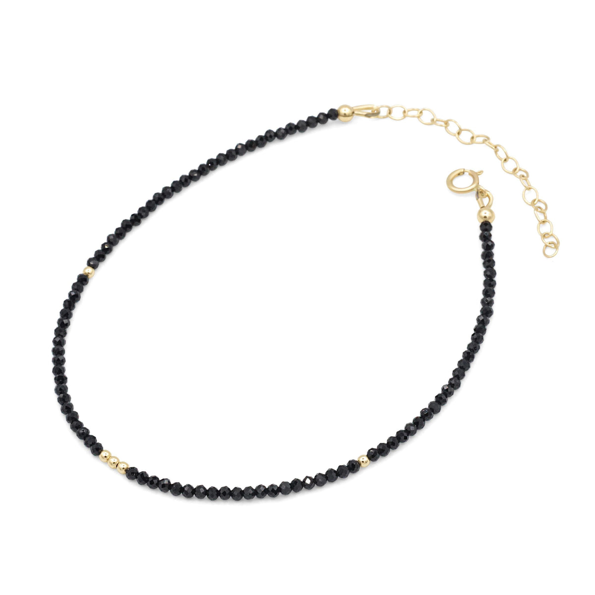 Black spinel anklet from Earthly Abundance featuring small polished black spinel beads on a delicate chain.