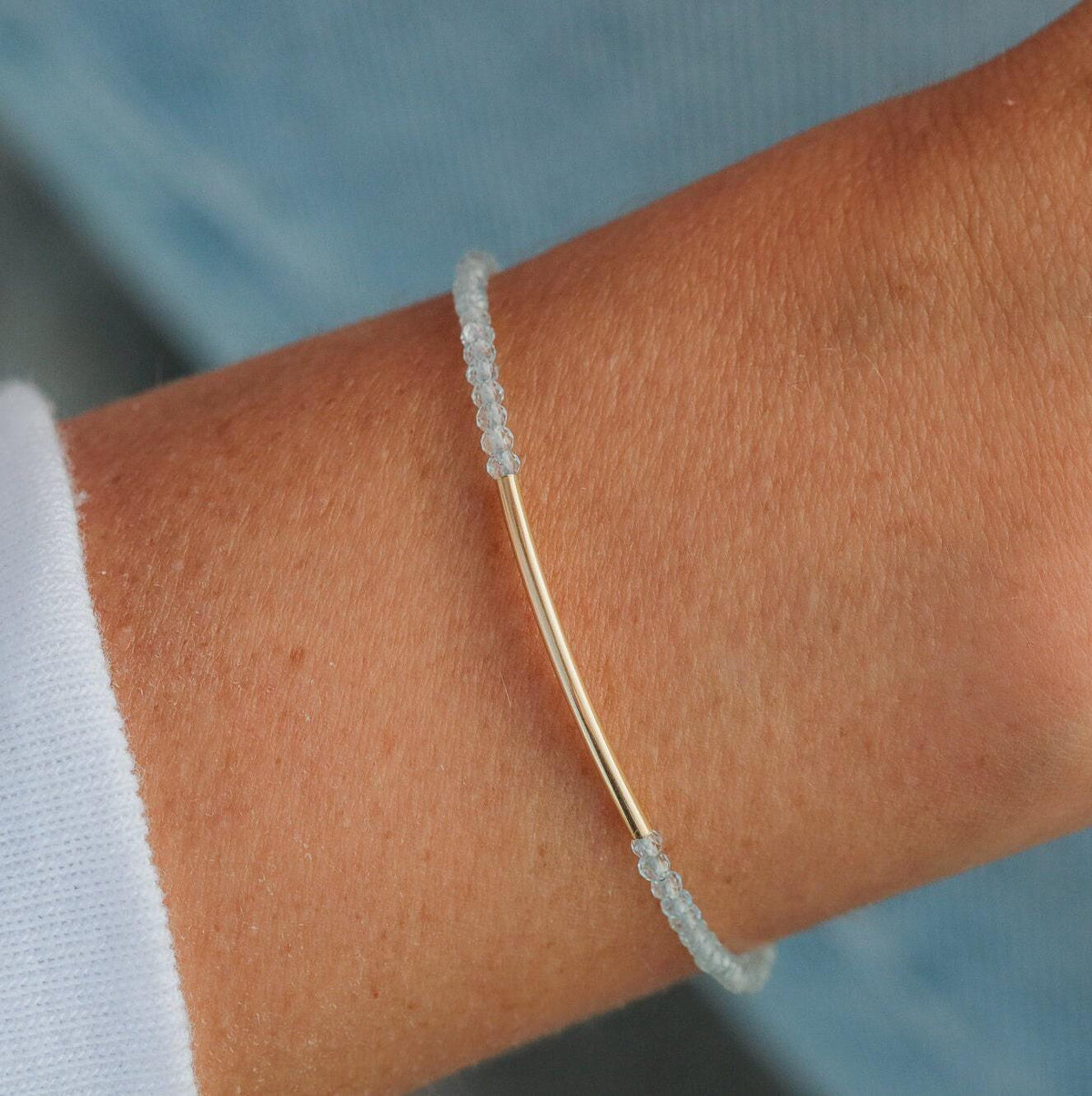 Earthly Abundance Softly Luminous Blue Topaz bracelet featuring polished blue topaz stones on a delicate chain.