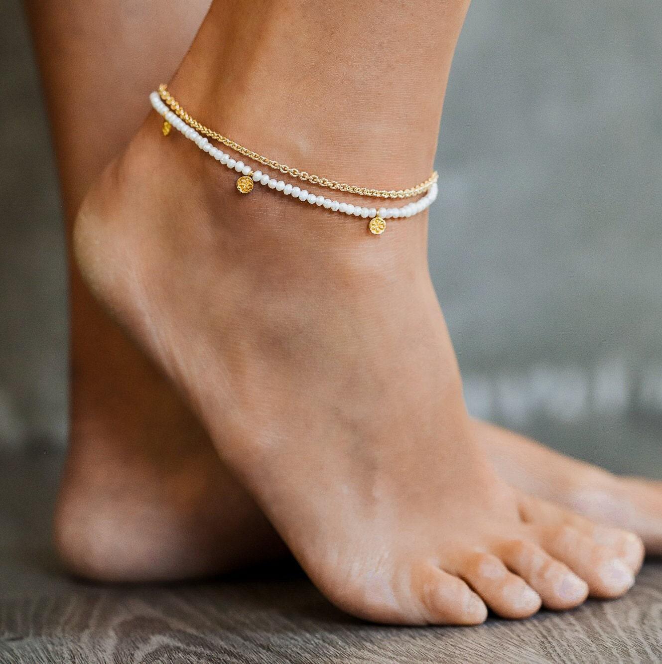 Fresh water pearl Daisy anklet by Earthly Abundance featuring delicate pearl and floral design on a silver chain.