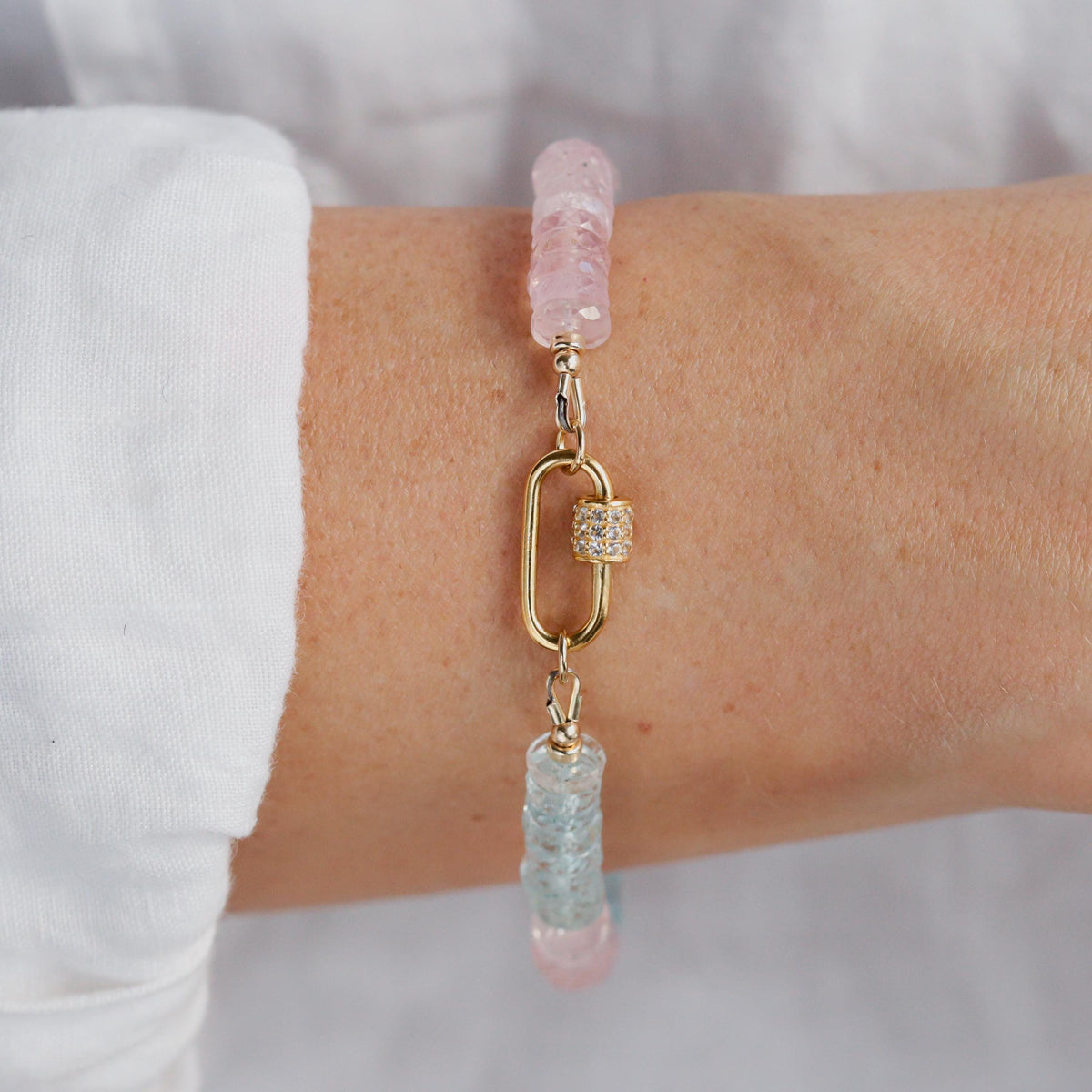 Earthly Abundance Morganite Beryl Topaz Carabiner bracelet featuring colorful gemstones and a sturdy metal clasp.
