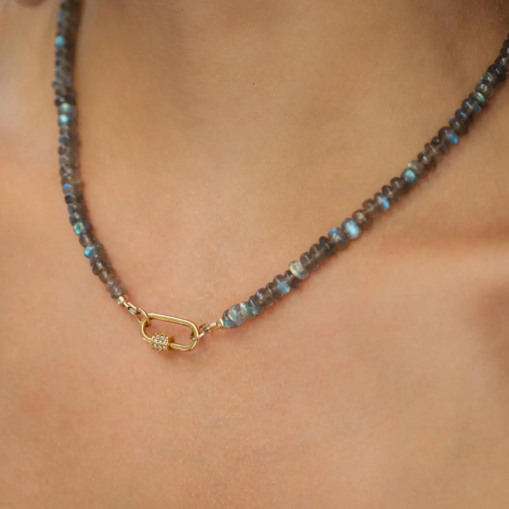 Labradorite and white topaz carabiner necklace with silver chain, featuring iridescent gemstone beads on a silver clasp.