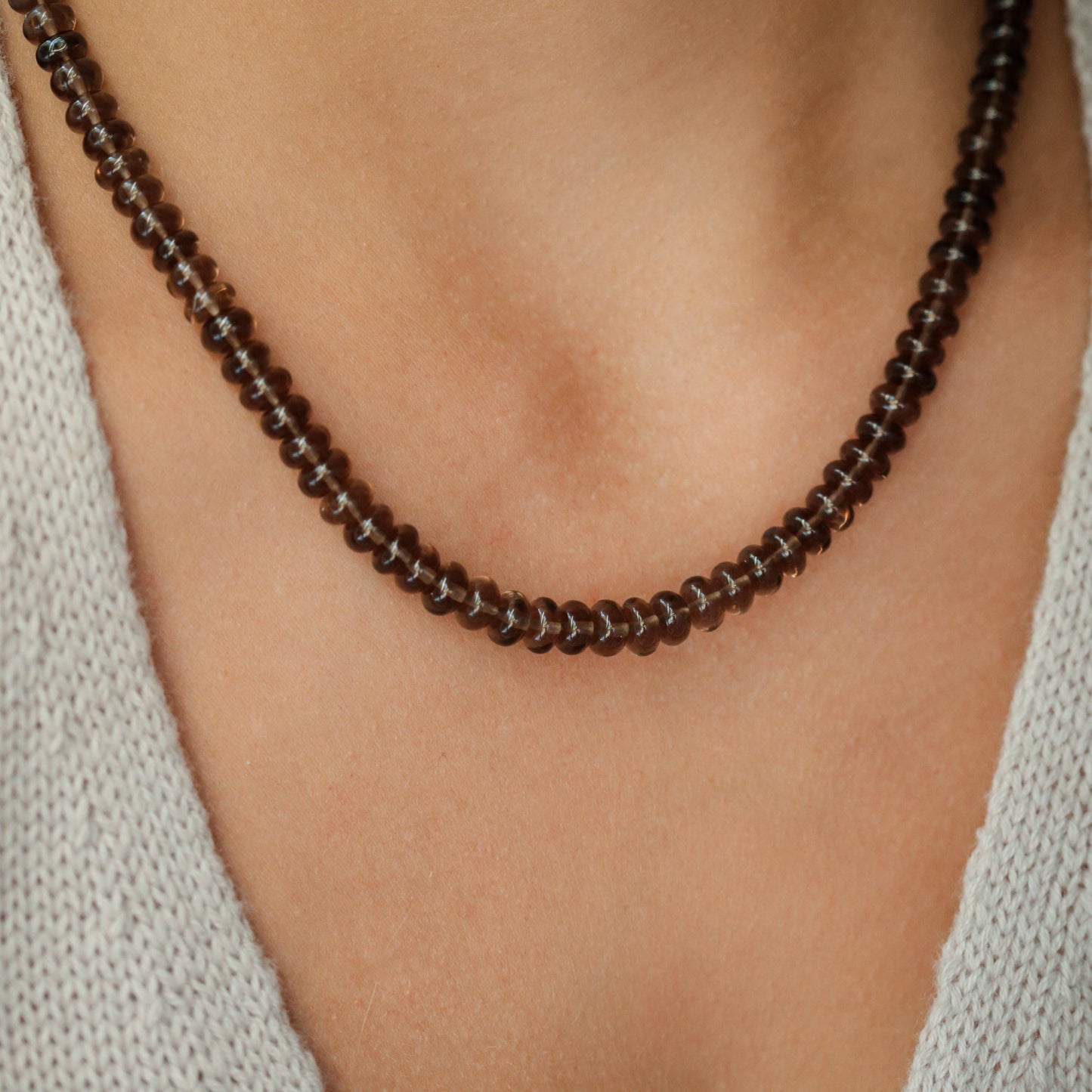 Smoky Quartz necklace from Earthly Abundance featuring a polished, teardrop-shaped gemstone on a delicate chain.