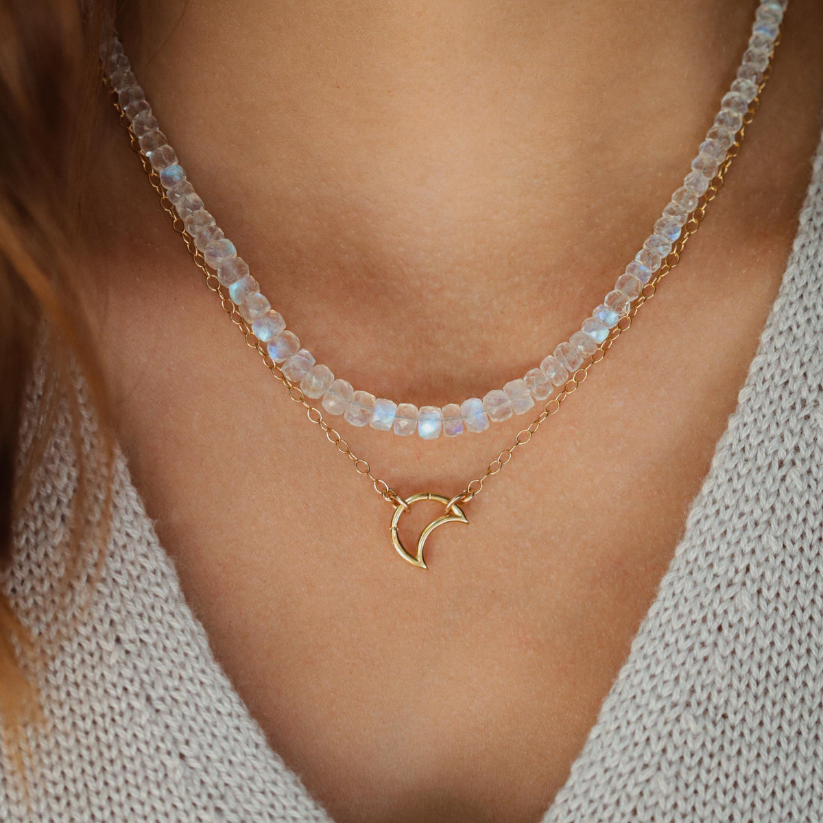 Earthly Abundance Moonspell Moonstone Necklace featuring a polished moonstone pendant on a delicate chain.