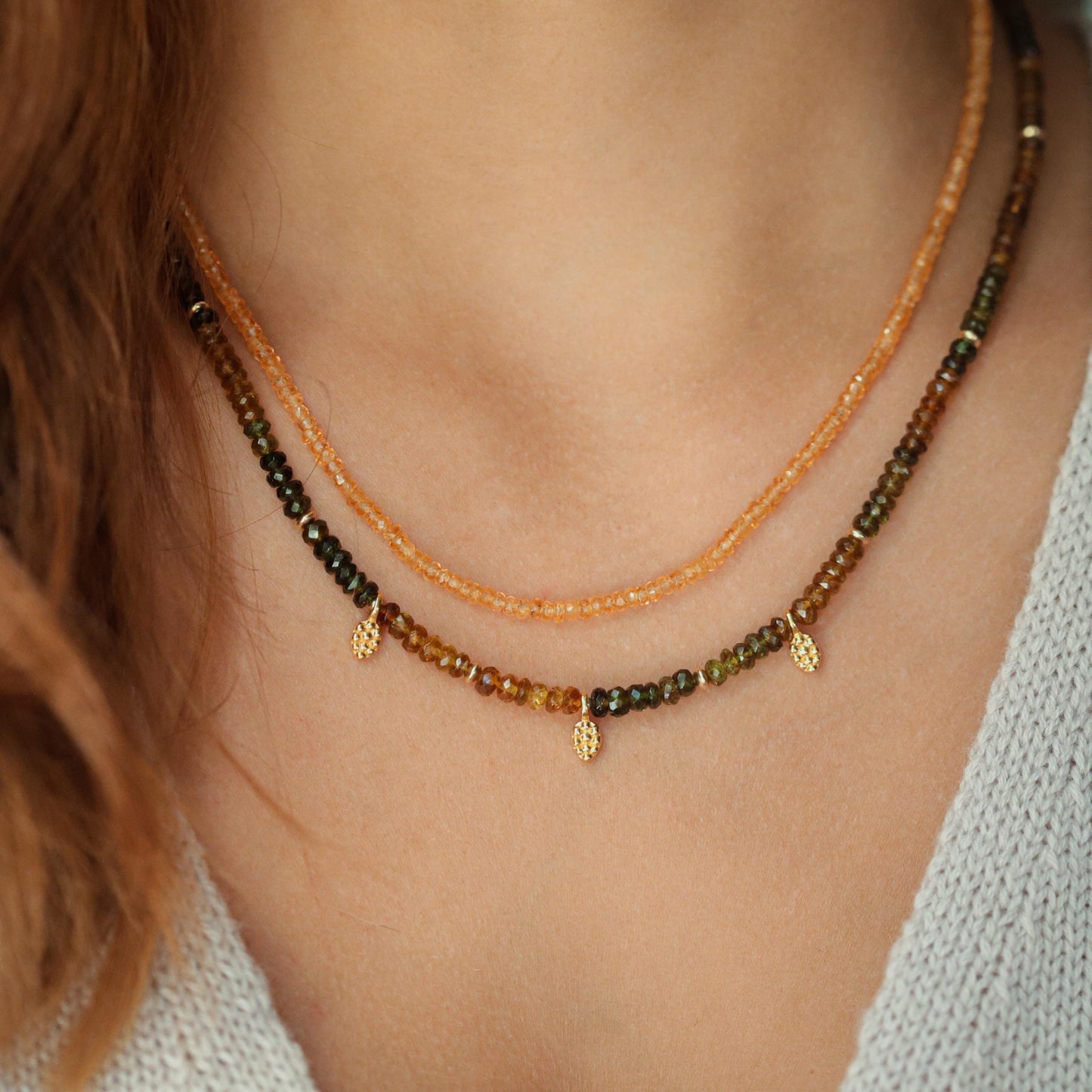 Orange sapphire necklace in 14K gold featuring a vibrant orange sapphire pendant, elegant jewelry by Earthly Abundance.
