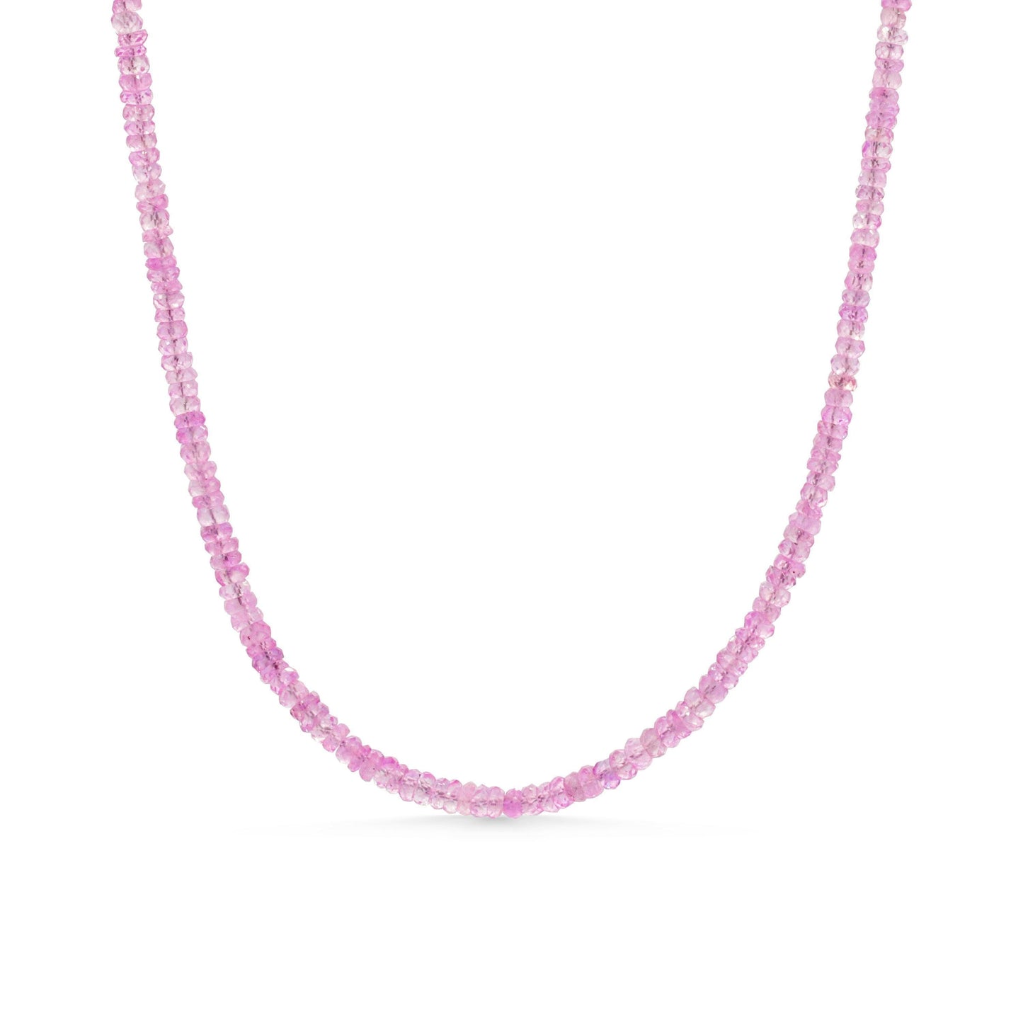 Pink sapphire necklace from Earthly Abundance featuring a delicate pink gemstone pendant on a fine chain.